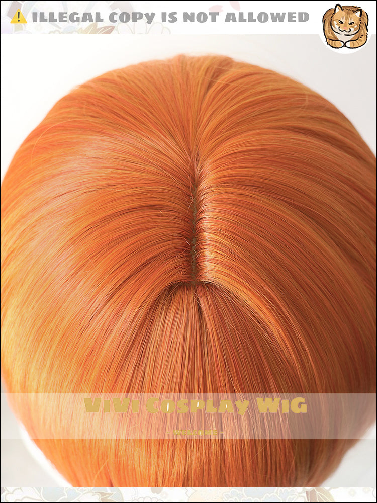 Close-up of vibrant orange gold hair fibers